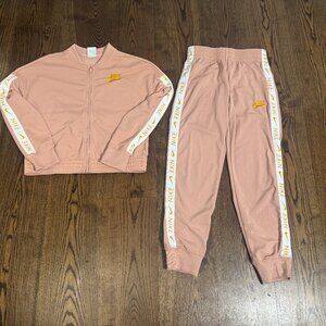 Nike Peach Jogger Set – Zip Jacket & Track Pants with Gold Logo Tape